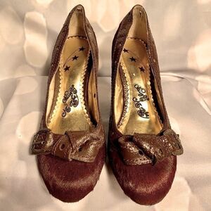 BROWN COW SKIN PUMPS Size 9.5 by NAUGHTY MONKEY